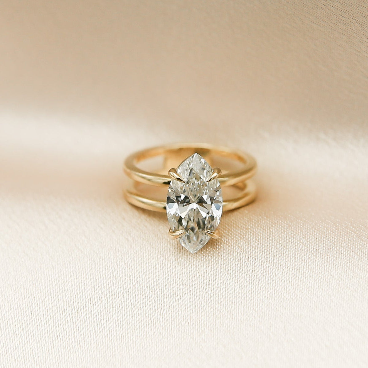 Marquise split band engagement ring by Milwaukee Jewelers Cival
Customize this unique ring with your choice of stone type, stone shape and stone size. Diamond, moissanite, round, oval, princess, cushion, asscher, marquise. Cival in Milwaukee Wisconsin.