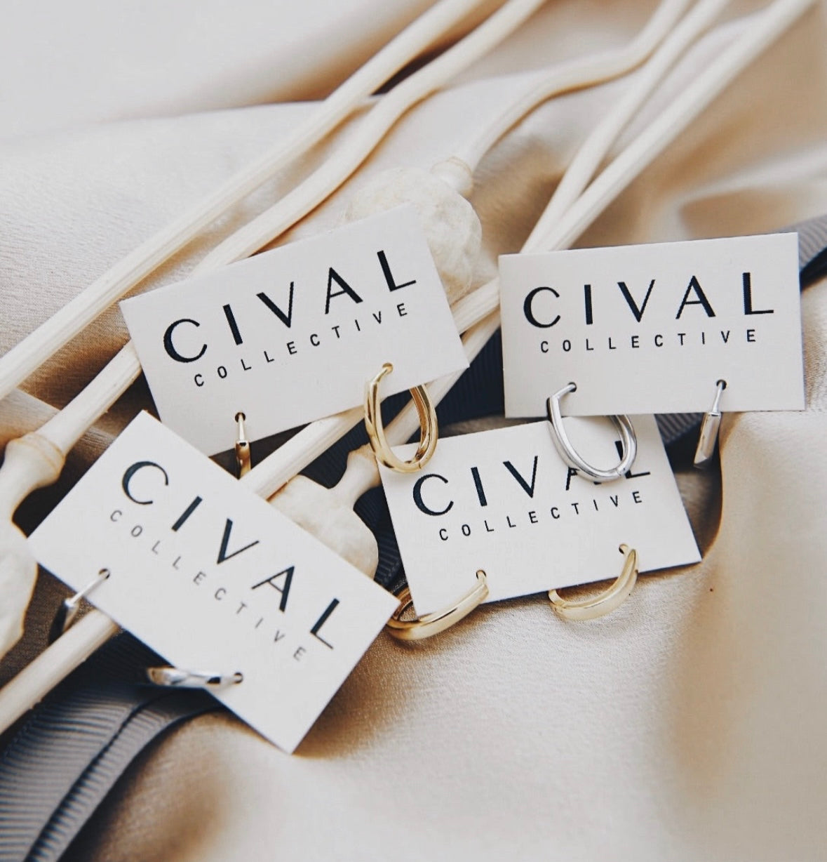 collection of gold vermiel and sterling silver sunna hoops available at cival collective