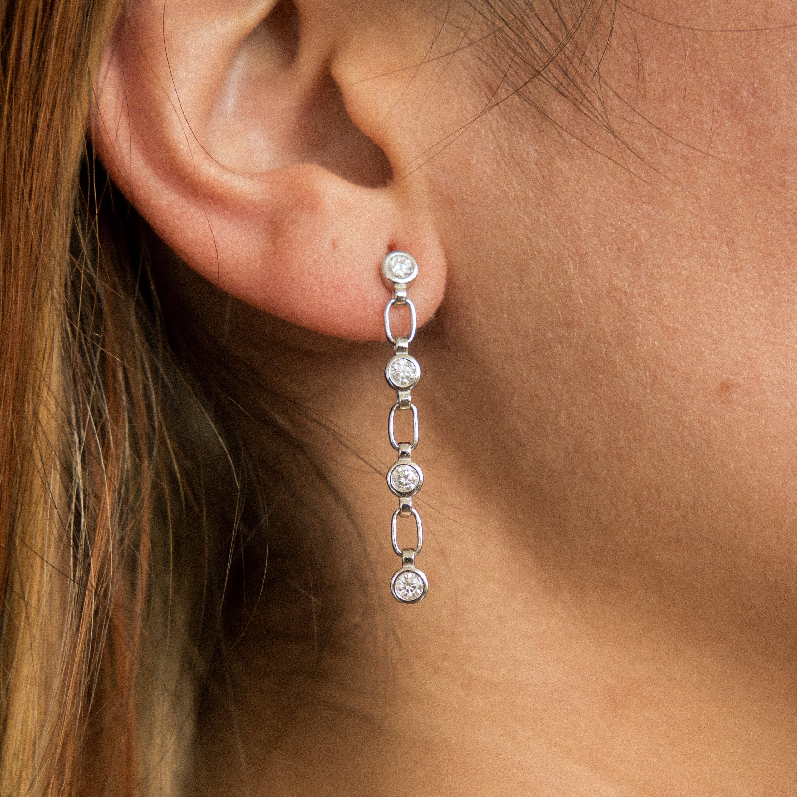 White gold vermeil post earings with paperclip chain and bezel set moissanites. Perfect demi-fine gift or everyday wear. Sold by Cival in Milwaukees Bayview.