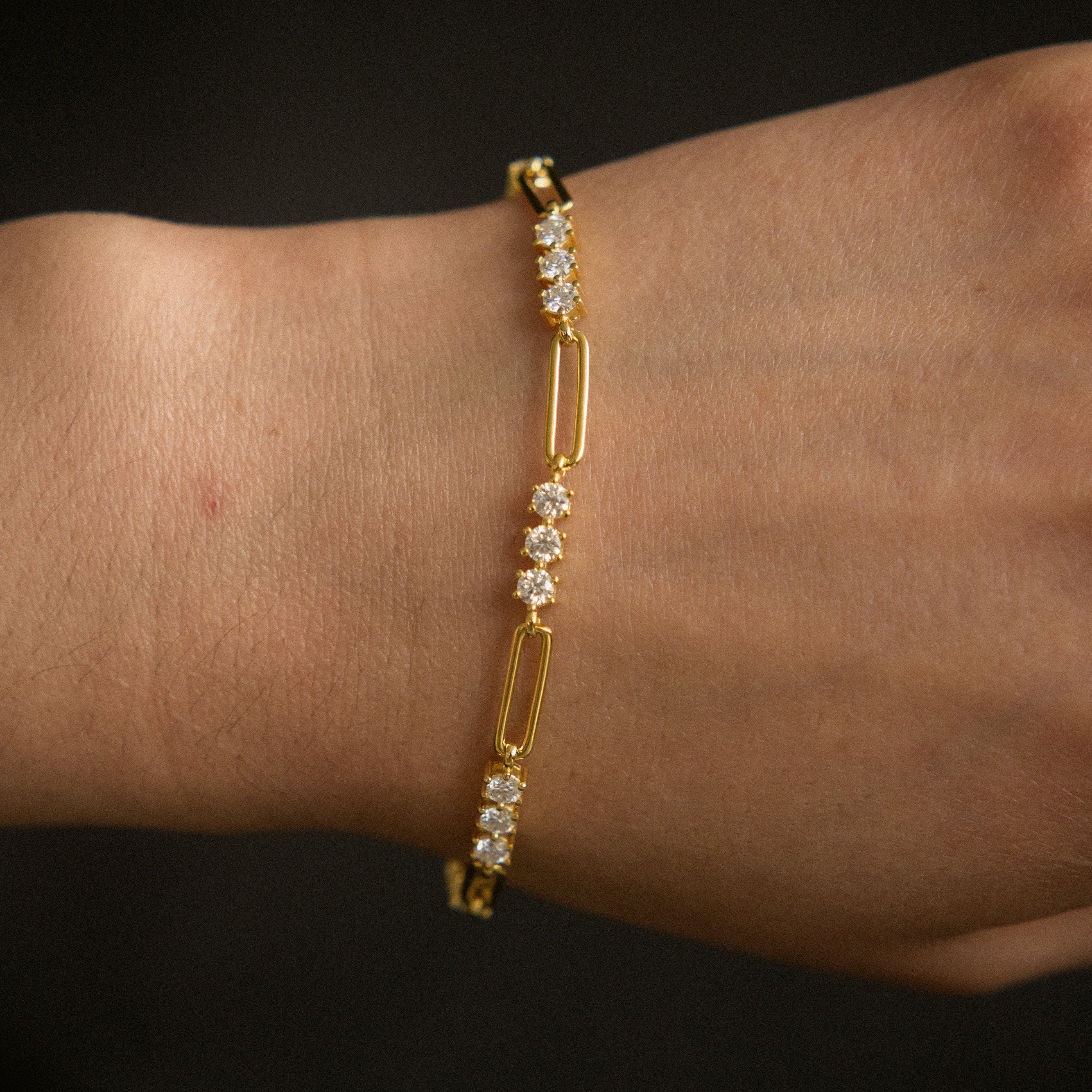 Moissanite paperclip tennis bracelet that is yellow gold filled, perfect demi fine gift with sparkle. Sold by Cival in Bayview Milwaukee Wisconsin.
