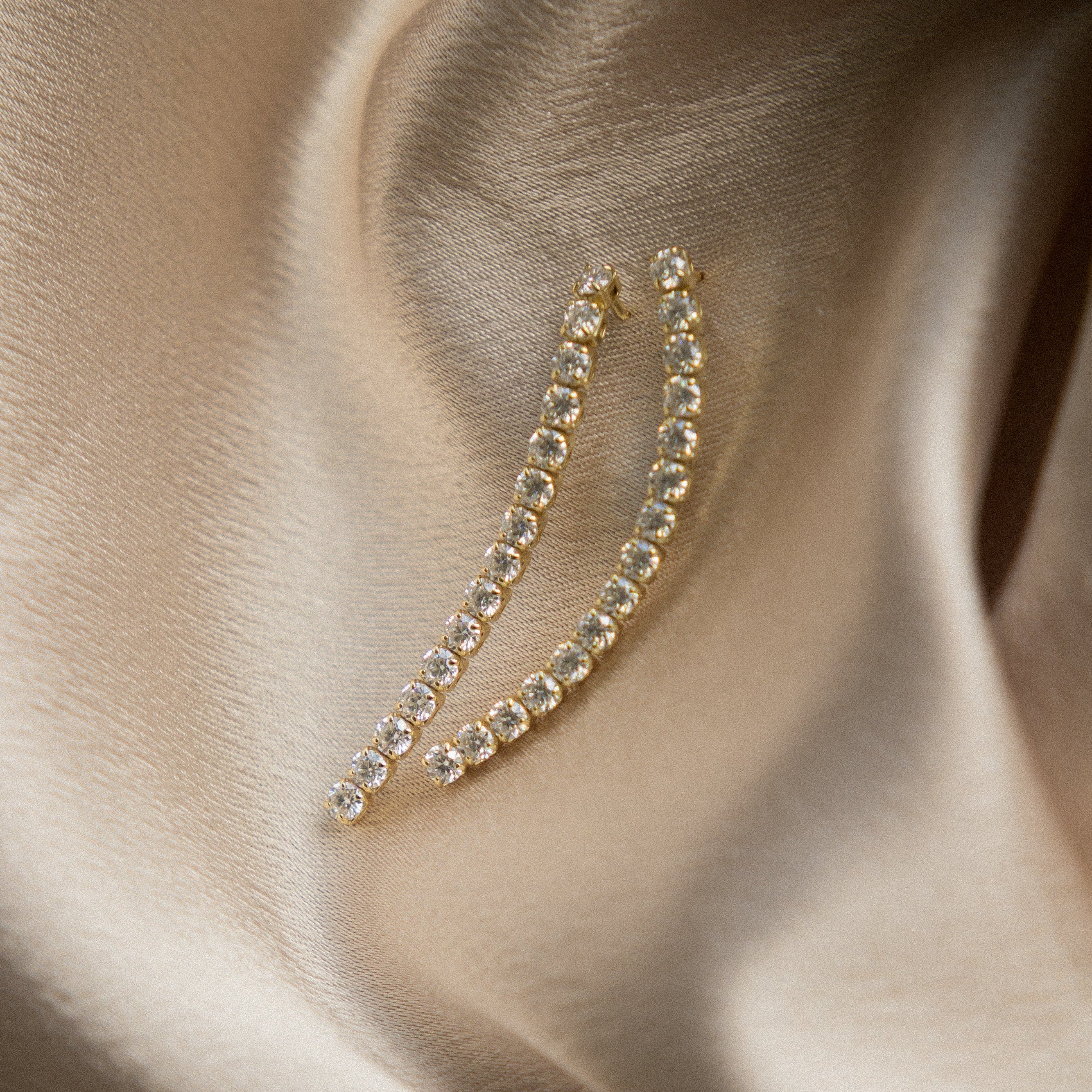 Moissanite demi fine yellow gold filled post earrings in a tassle like manor. Perfect gift or everyday wear. Sold by Cival in bayview milwaukee wisconsin