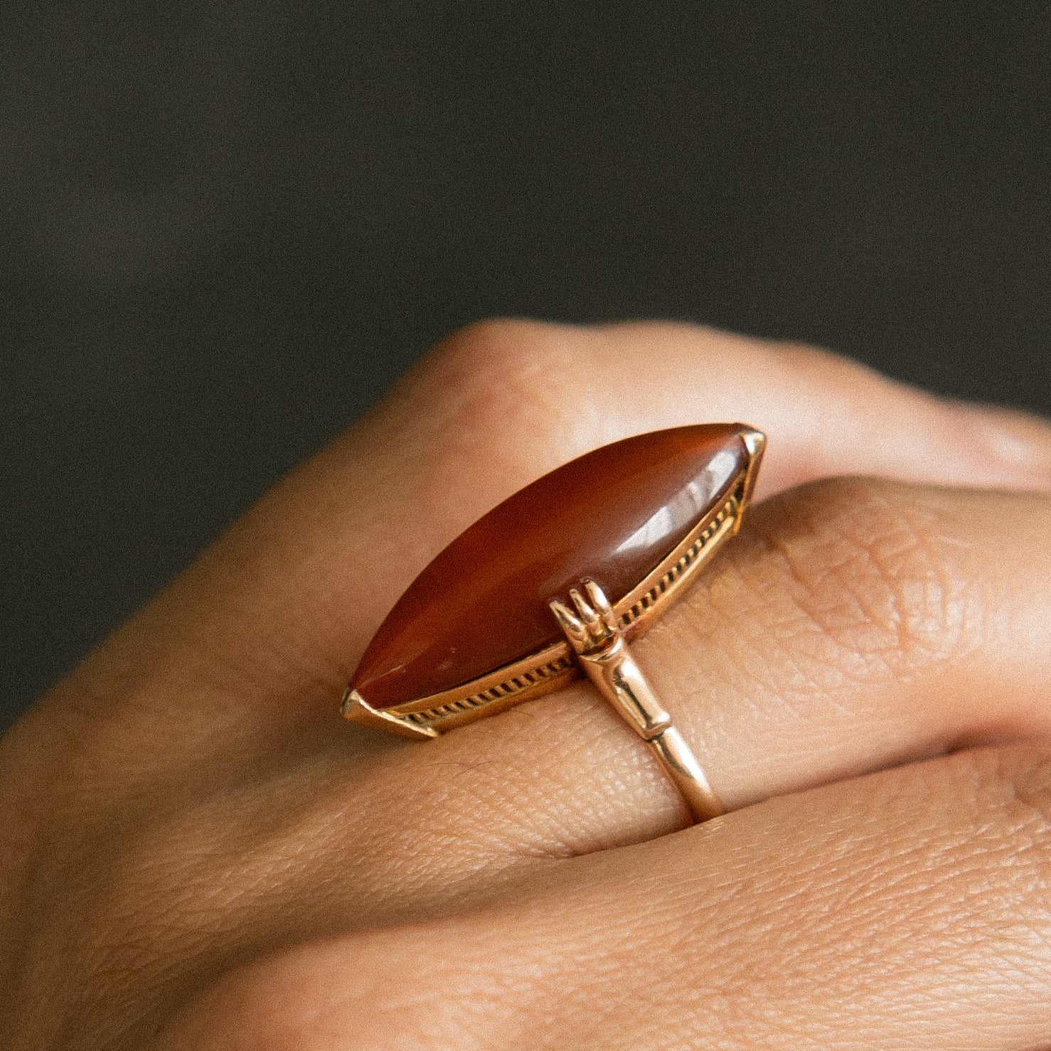 Antique 18k gold ring orange stone on hand