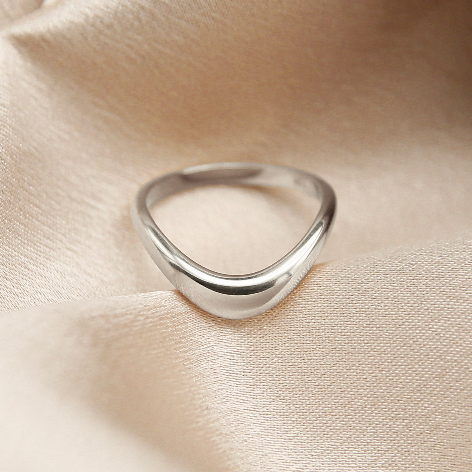 Image of silver band ring made by Cival Collective Jewelry Studio, Milwaukee, Wisconsin