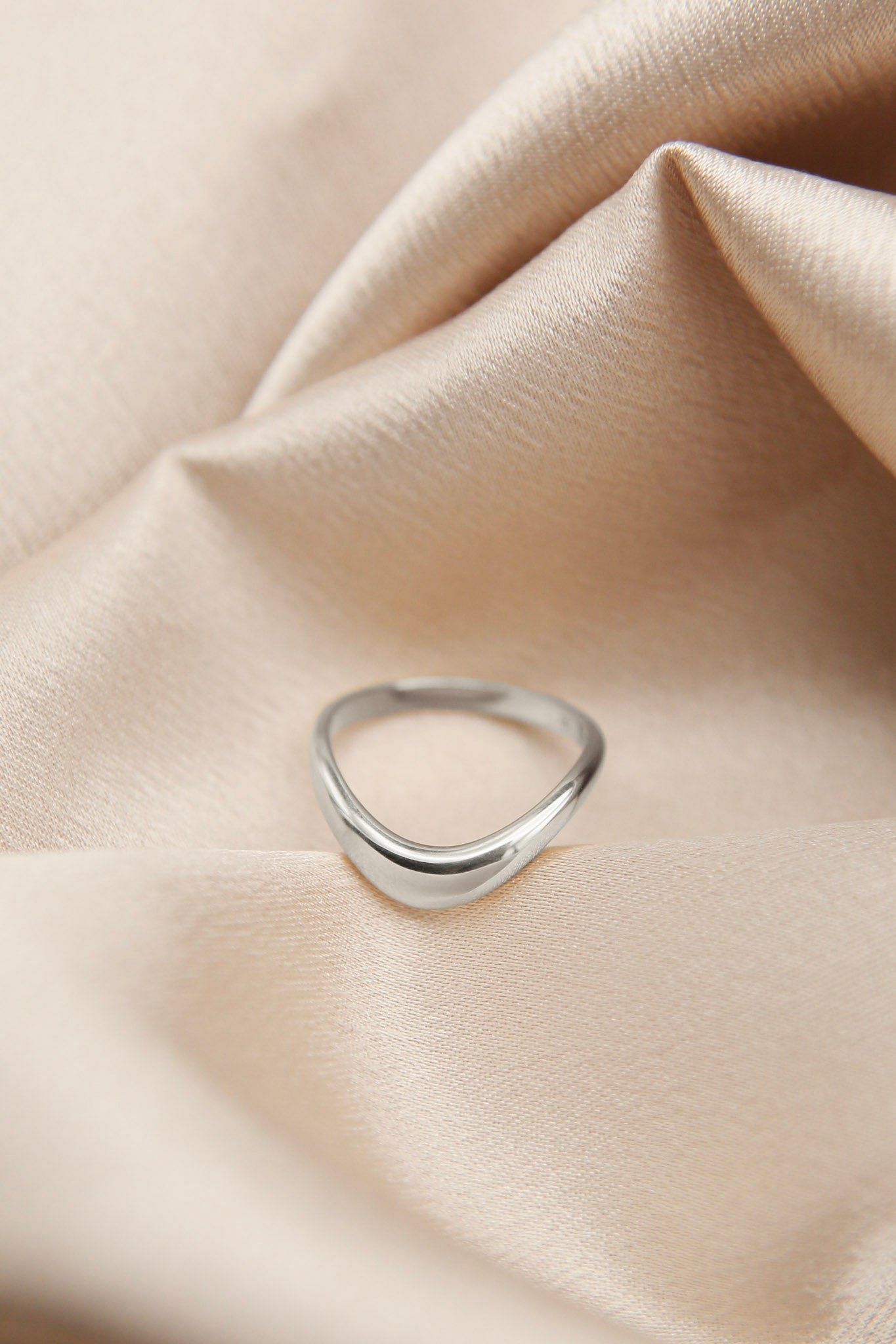 Image of silver band ring made by Cival Collective Jewelry Studio, Milwaukee, Wisconsin