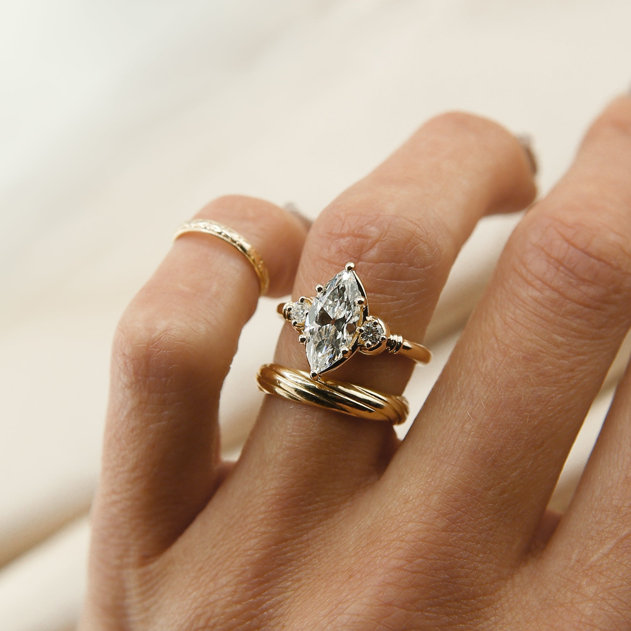 Semi-Custom Made-to-order engagement wedding ring. Customize this unique ring with your choice of stone type, stone shape and stone size. Diamond, moissanite, round, oval, princess, cushion, asscher, marquise. Three stone ring in 14k gold. Made by Cival in Milwaukee Wisconsin.