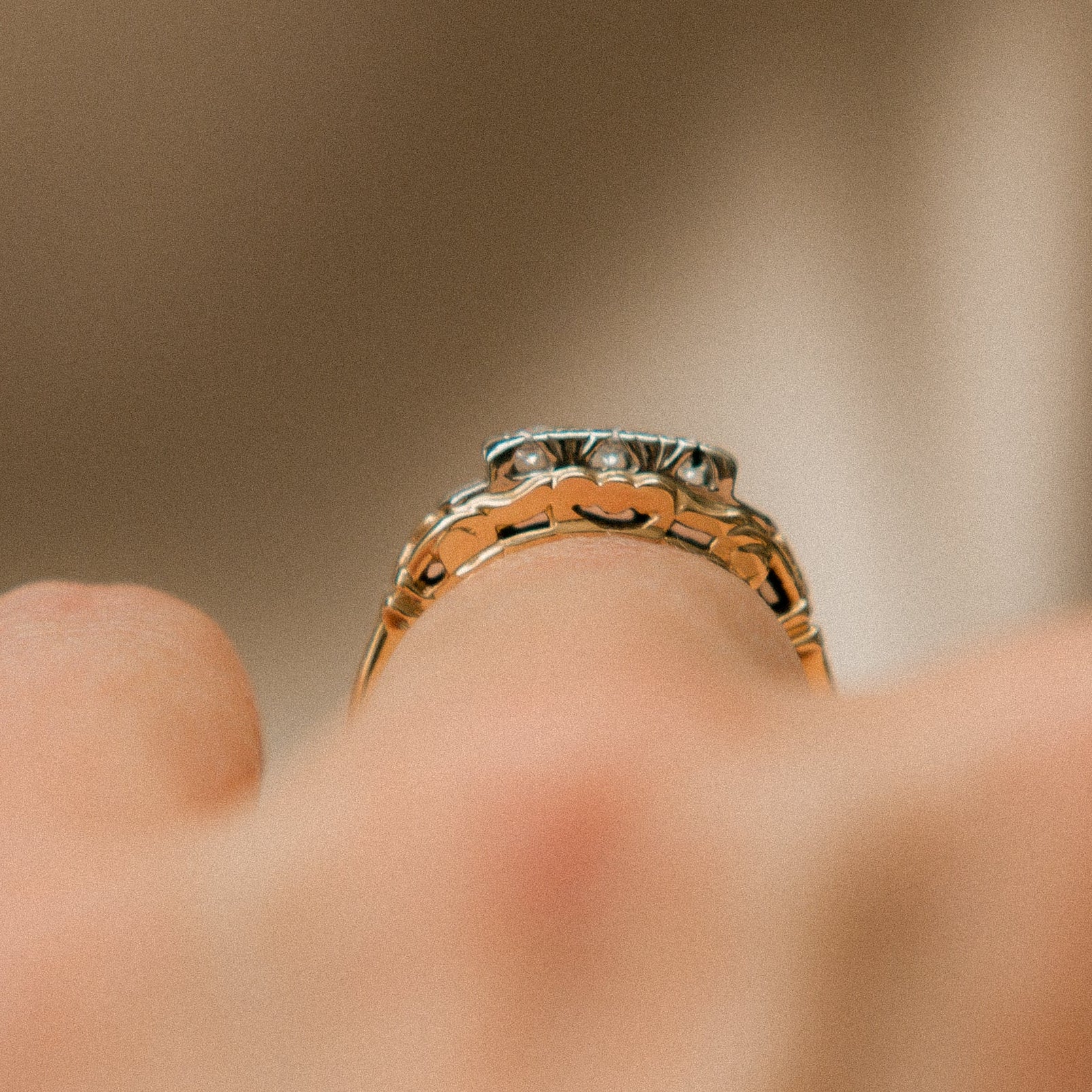 Two tone die struck cast three stone engagement ring | sz 6.5
