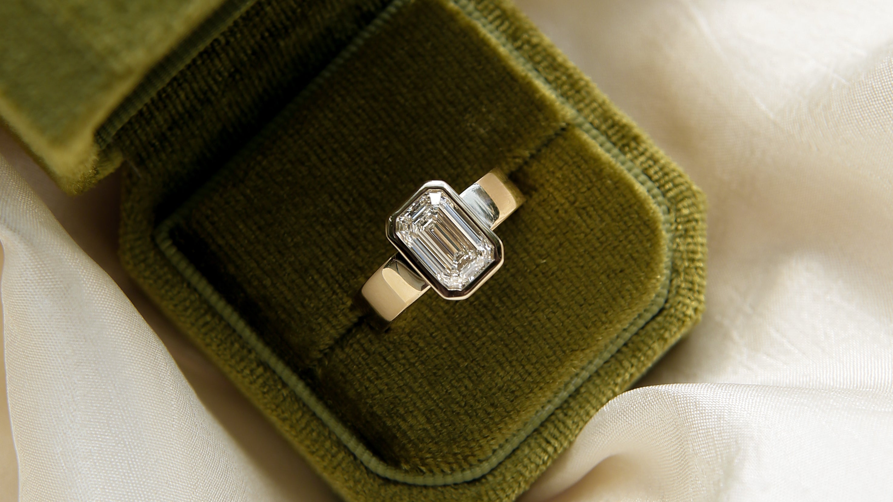 Customize this unique wedding ring with your choice of stone type, stone shape and stone size. Diamond, moissanite, round, oval, princess, cushion, asscher, marquise. Cival in Milwaukee Wisconsin.