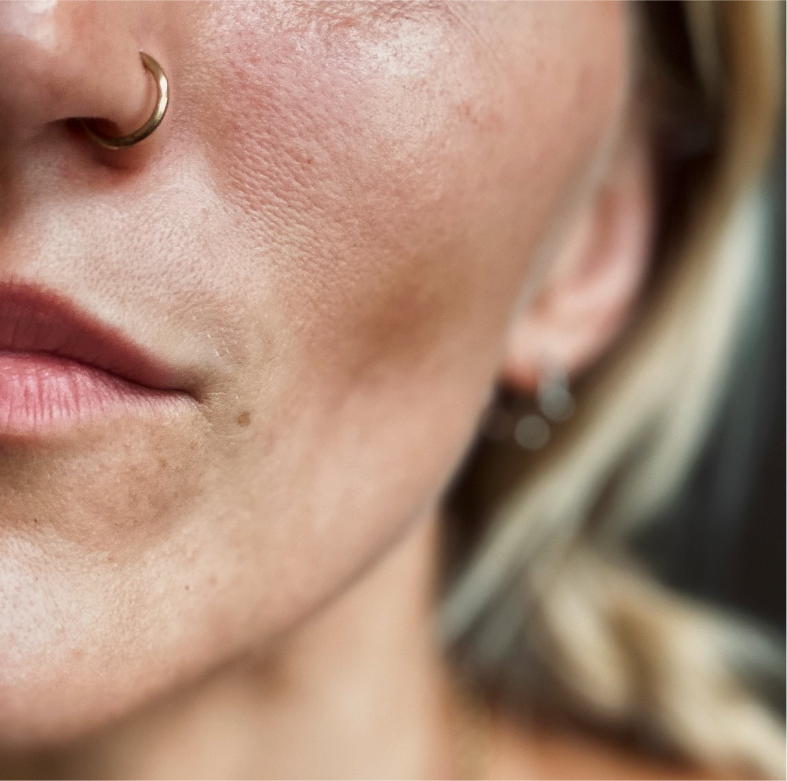 gold nose ring on model