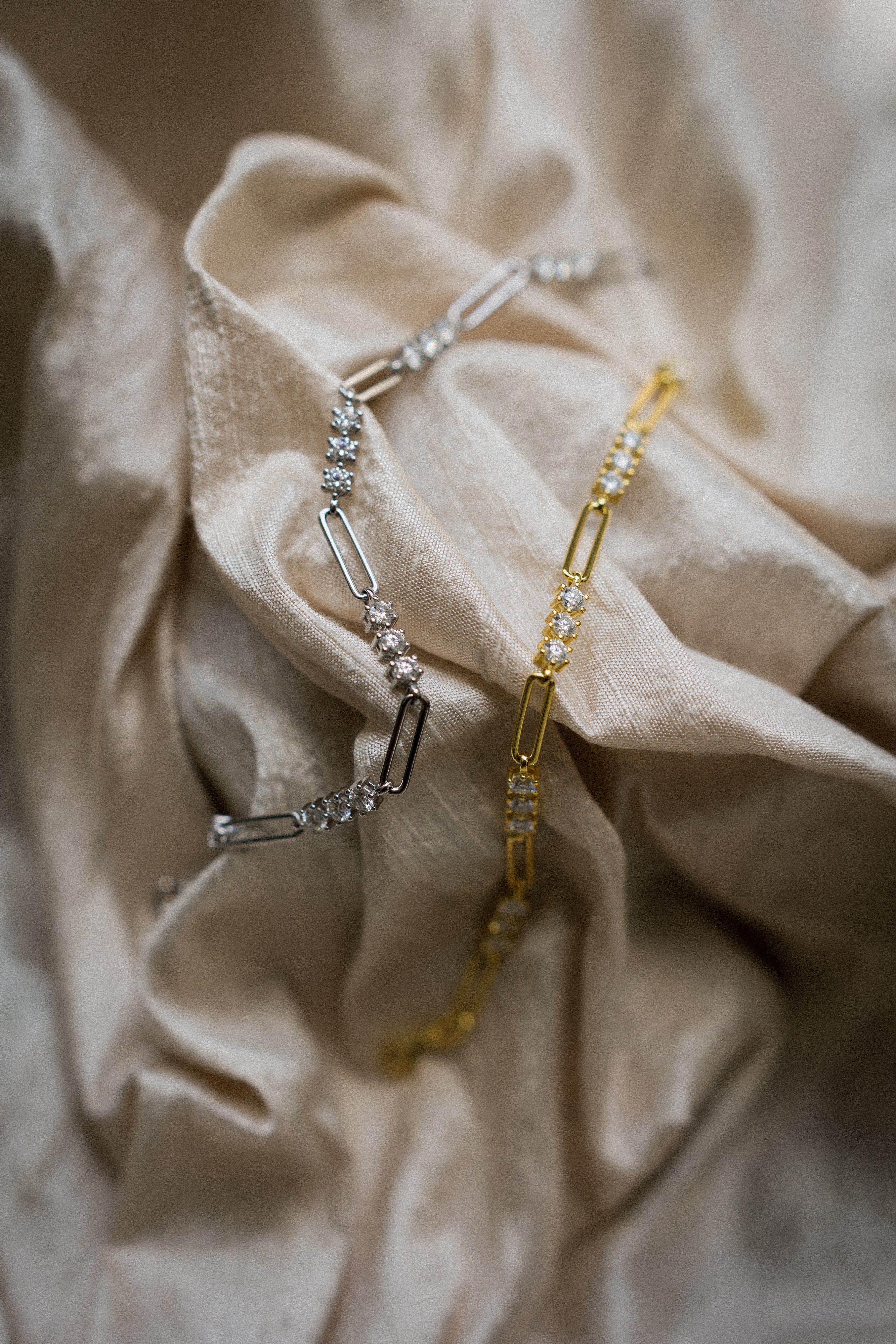 Moissanite paperclip tennis bracelet, white gold  and yellow gold filled sold by Cival in BayView Milwaukee Wisconsin. Perfect for a demi fine gift. 