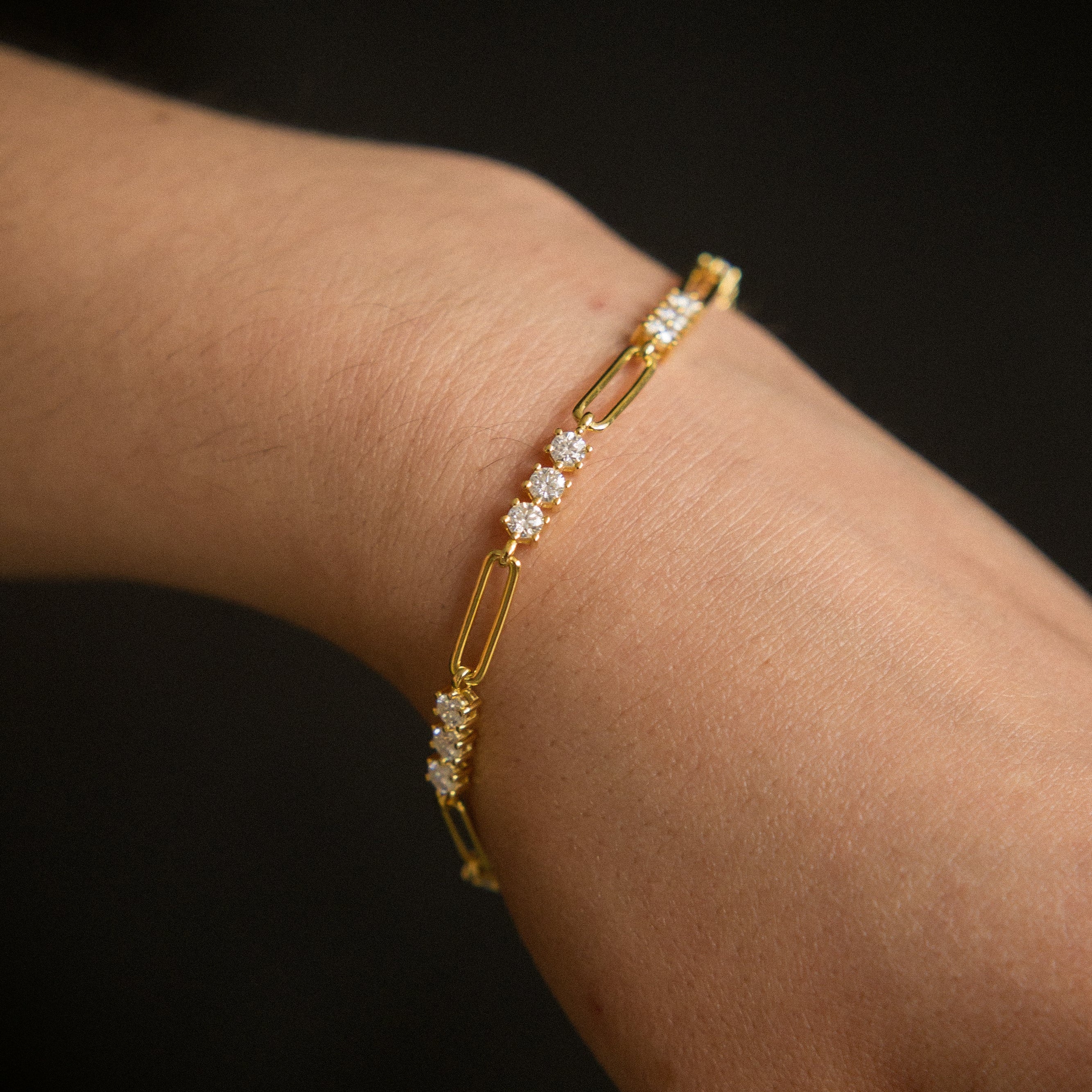 Moissanite paperclip tennis bracelet that is yellow gold filled, perfect demi fine gift with sparkle. Sold by Cival in Bayview Milwaukee Wisconsin.