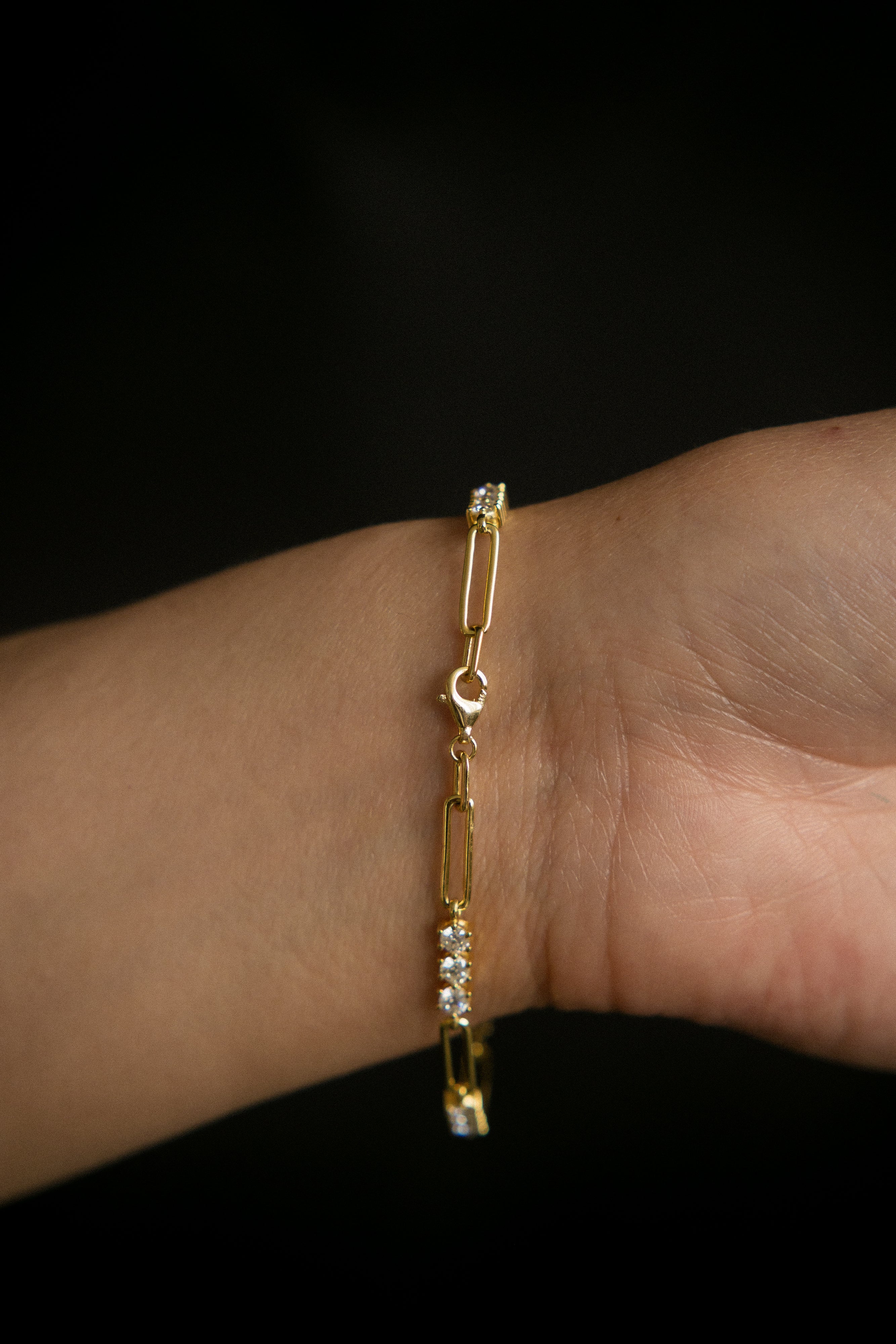 Moissanite paperclip tennis bracelet that is yellow gold filled, perfect demi fine gift with sparkle. Sold by Cival in Bayview Milwaukee Wisconsin.