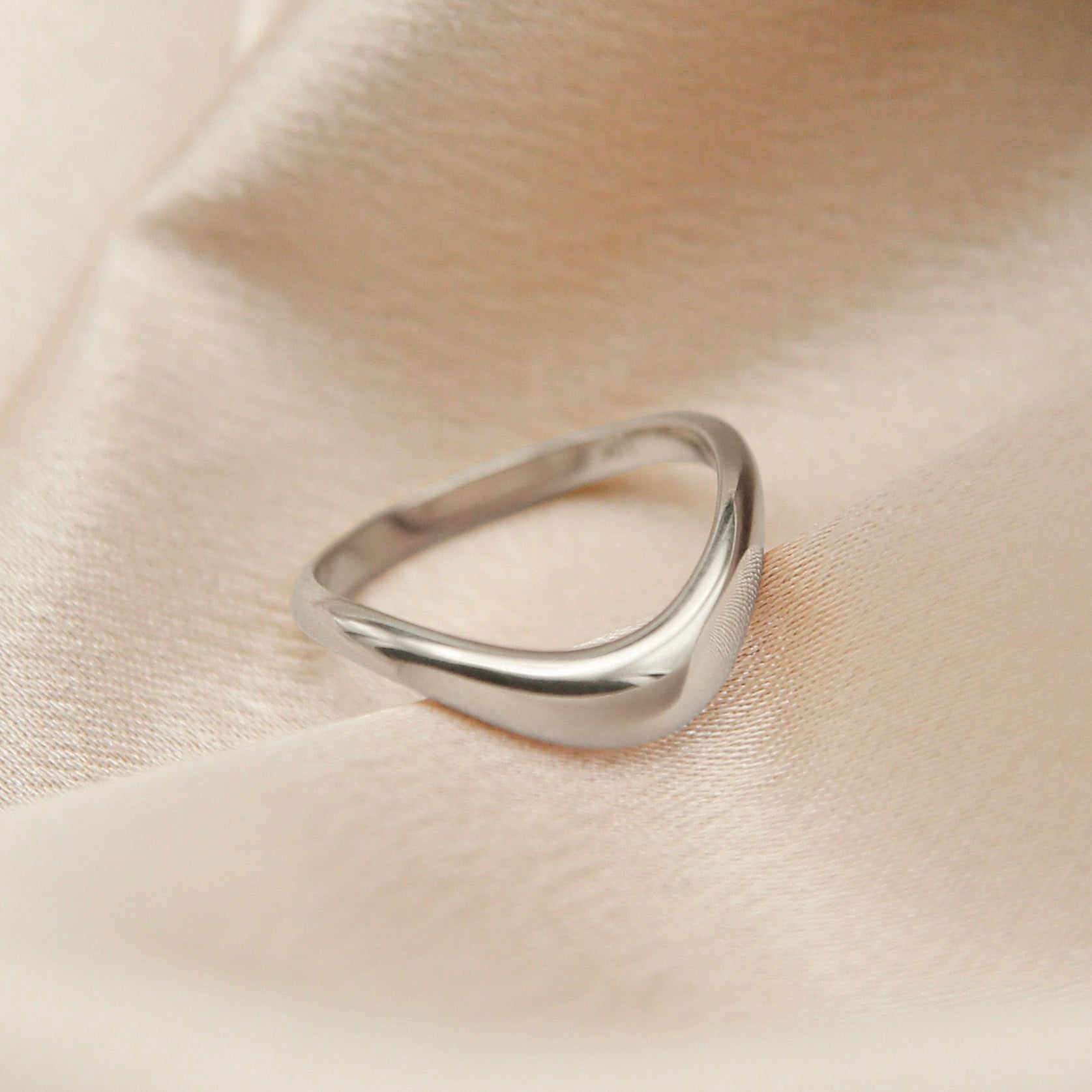 Image of silver band ring made by Cival Collective Jewelry Studio, Milwaukee, Wisconsin