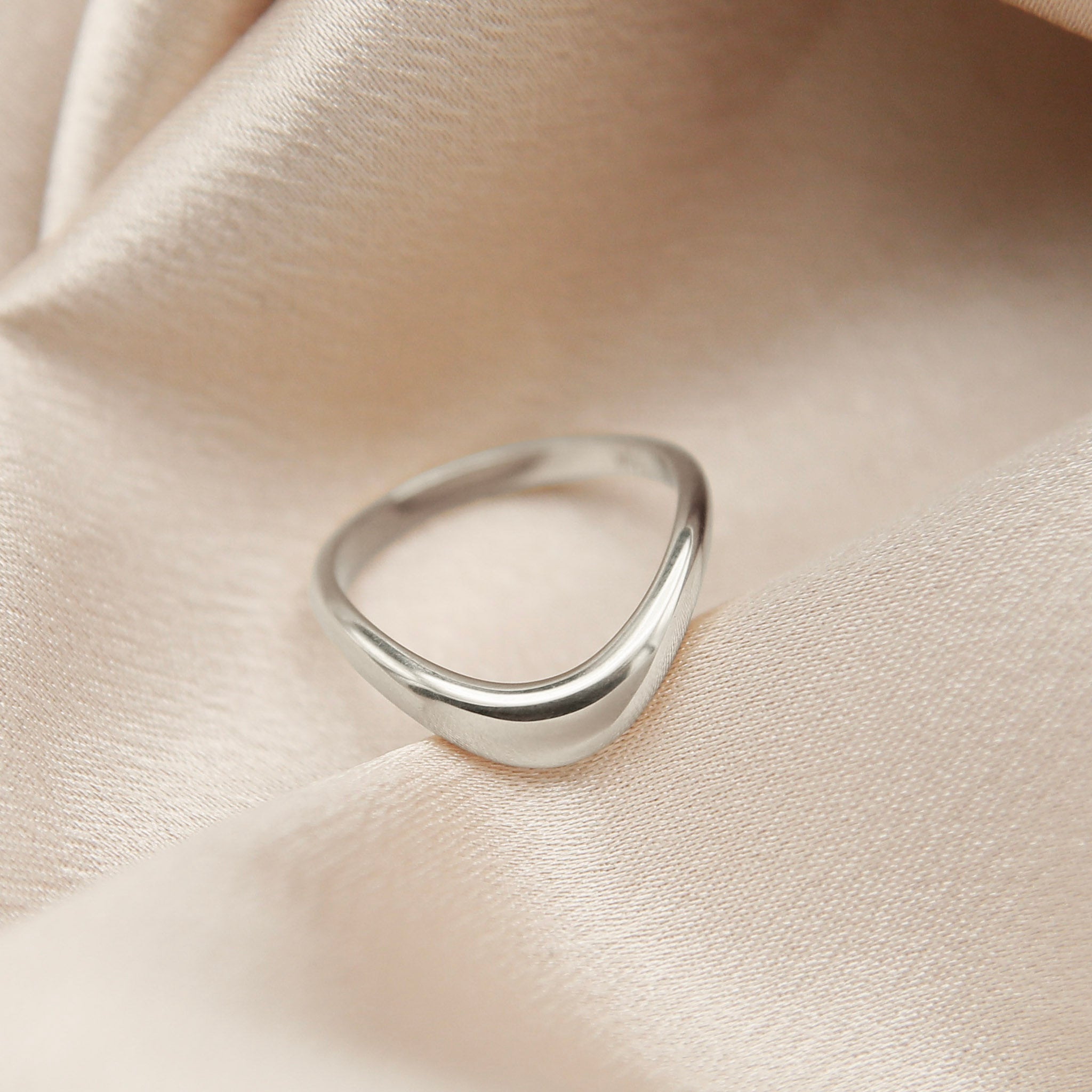 Image of silver band ring made by Cival Collective Jewelry Studio, Milwaukee, Wisconsin