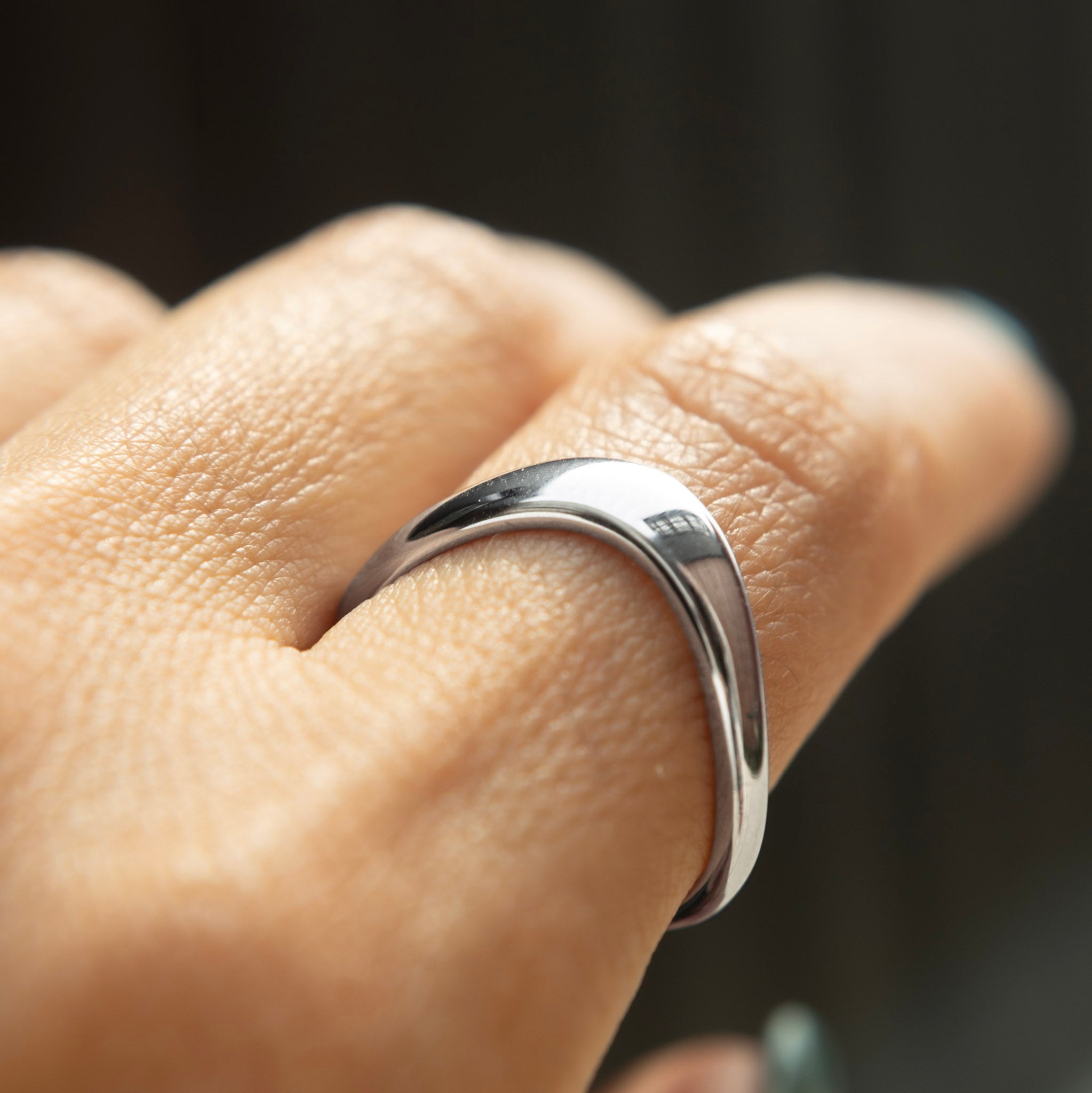 Image of silver band ring made by Cival Collective Jewelry Studio, Milwaukee, Wisconsin