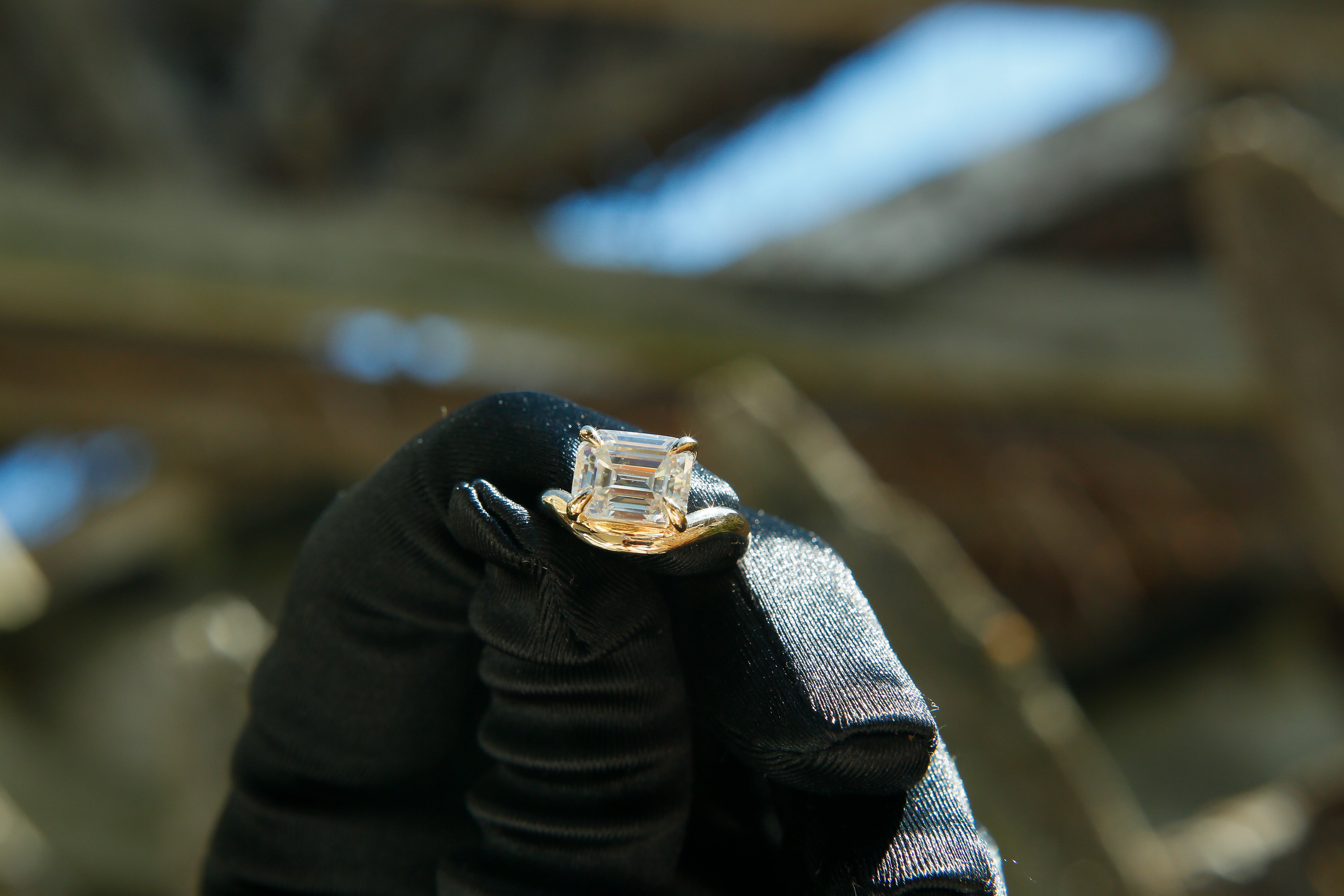 Hydra ring with a soft curved band, an emerald cut moissanite. Perfect for an engagement