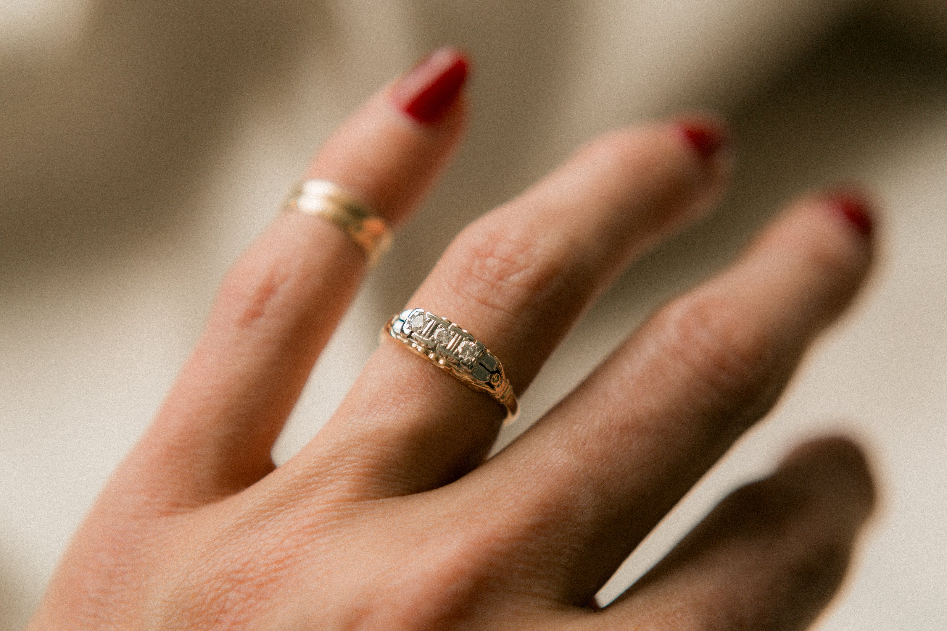 Two tone die struck cast three stone engagement ring | sz 6.5
