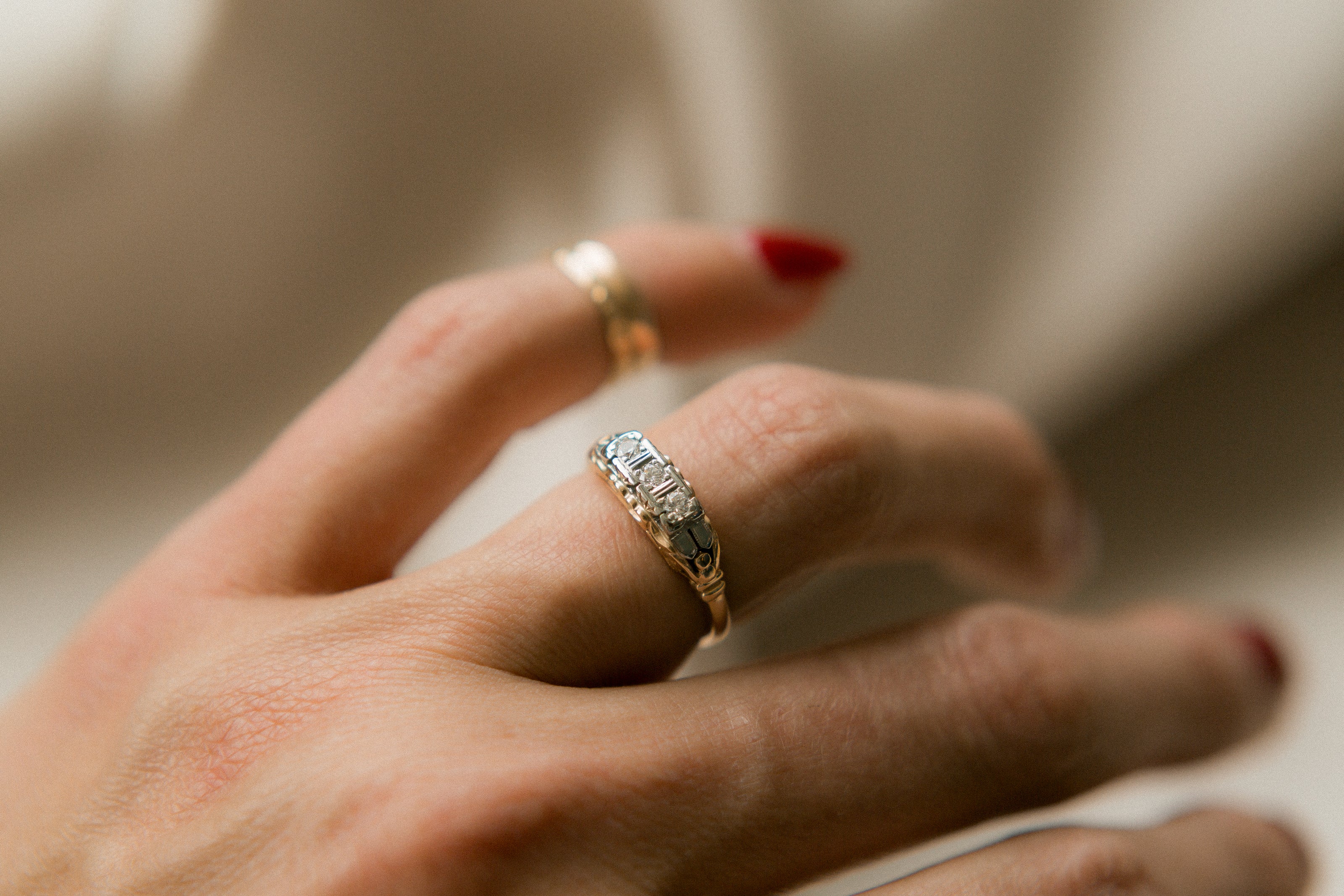 Two tone die struck cast three stone engagement ring | sz 6.5