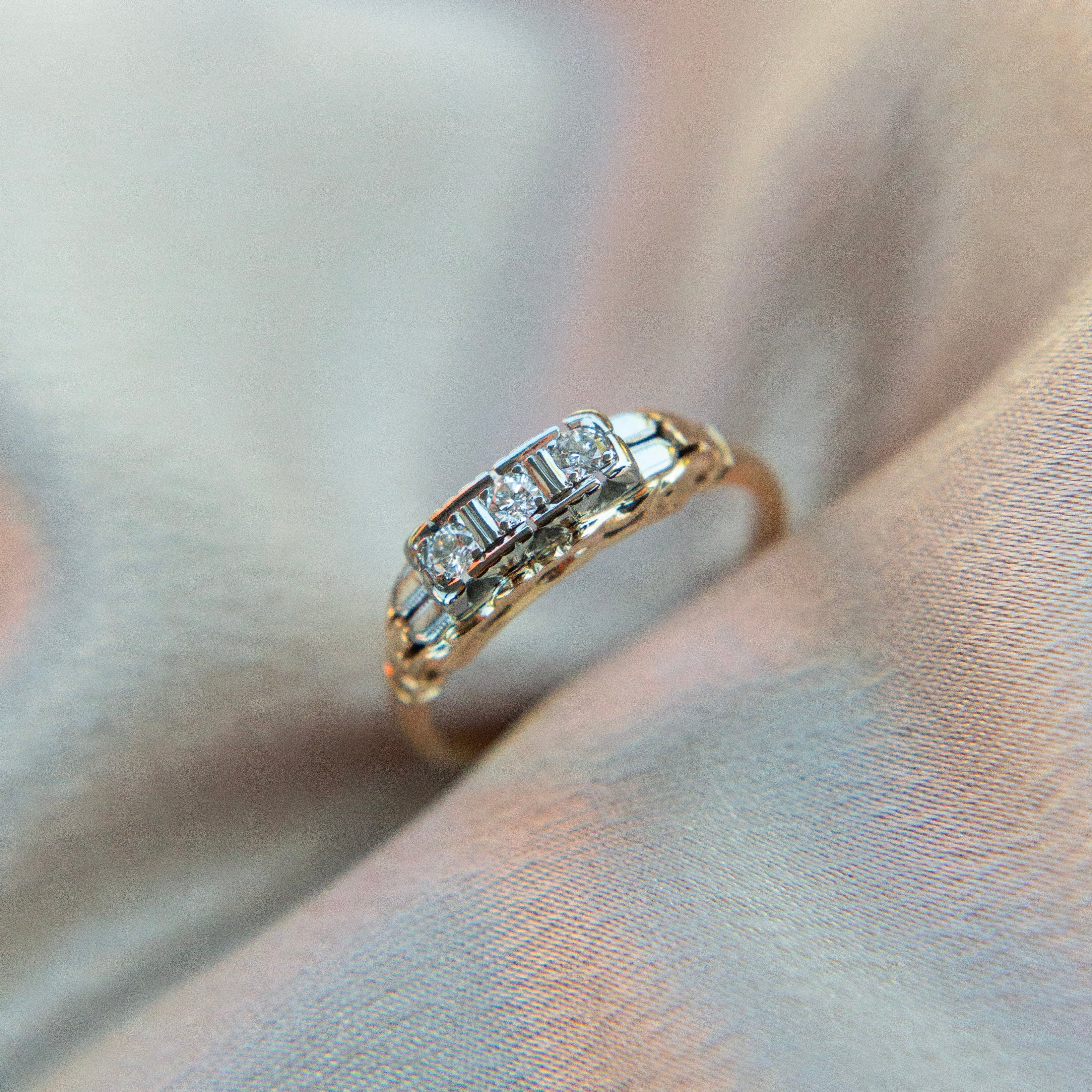 Two tone die struck cast three stone engagement ring | sz 6.5