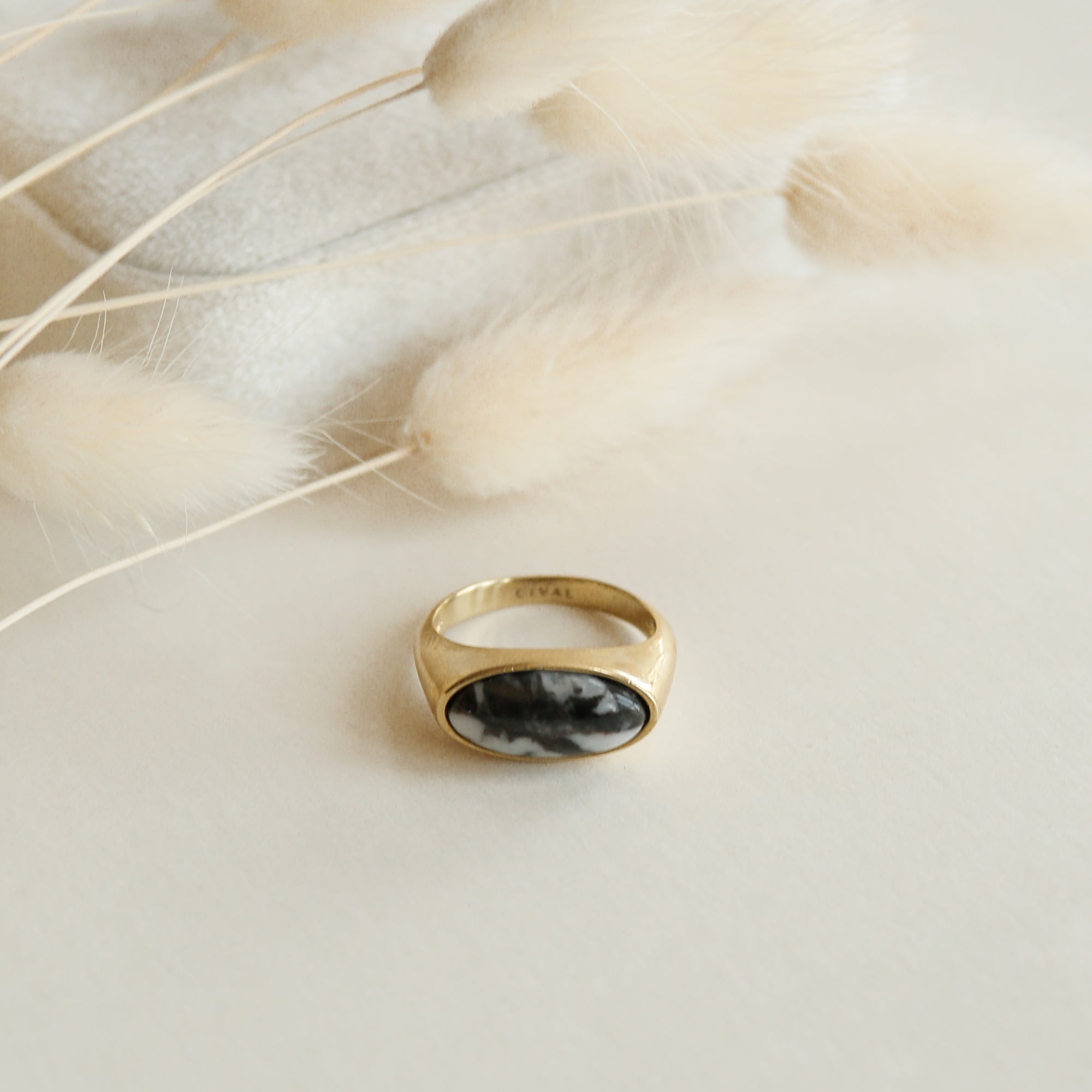 Brass ring with oval black and white stone found at Civaal collective in Milwaukee