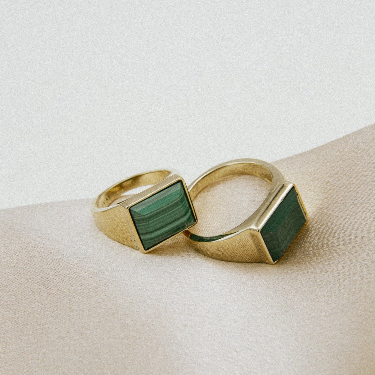 close up of Velma ring with malachite set stones. Signet ring designed in house by Cival Collective in milwaukee wisconsin