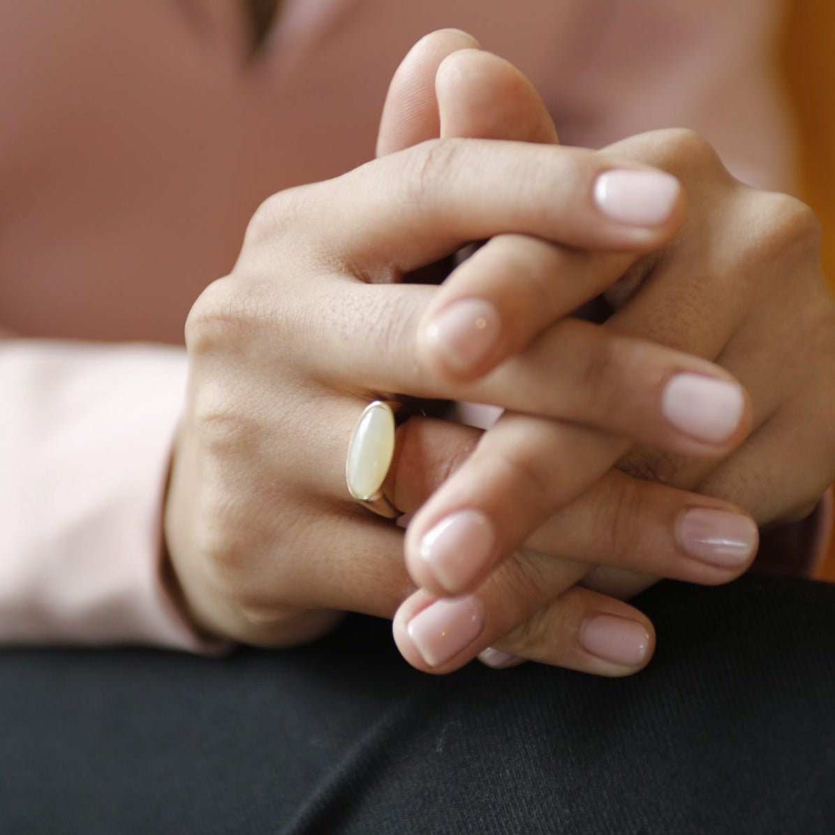 Brass dome ring with cloudy white oval stone